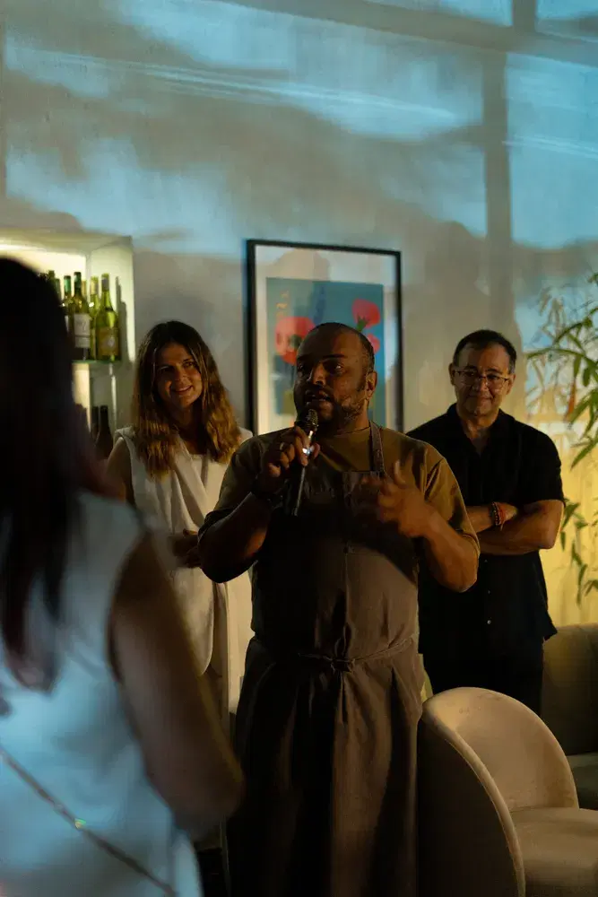 A member of the Postcard community smiling at a gathering